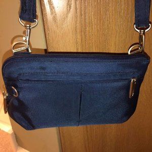 Travelon Anti-Theft Classic Convertible Crossbody and Wasitpack purse blue color